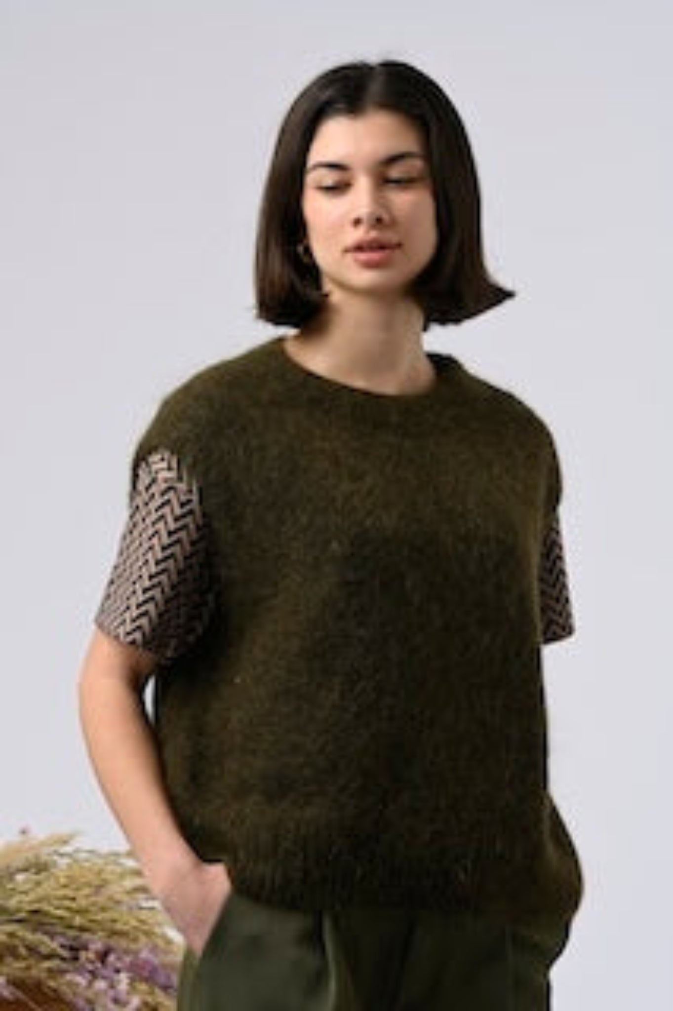 woman wearing soft angora and wool blend vest ideal for transitional weather
