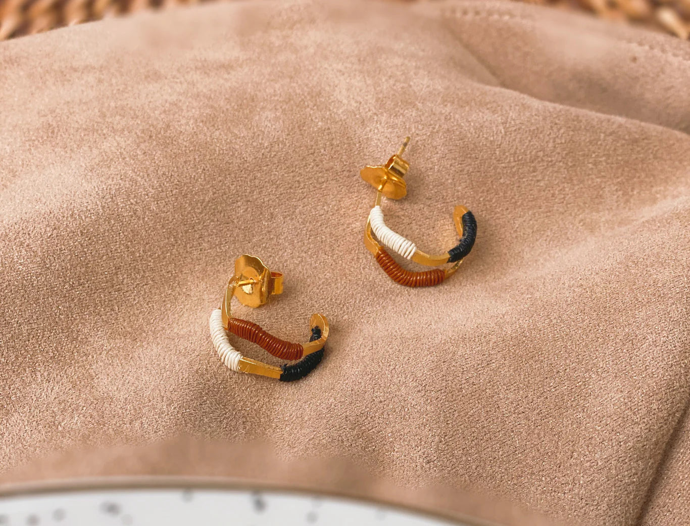 Gold sculptural hoops with natural fibre detail - Ethical jewellery gold wave earrings Bamboleira