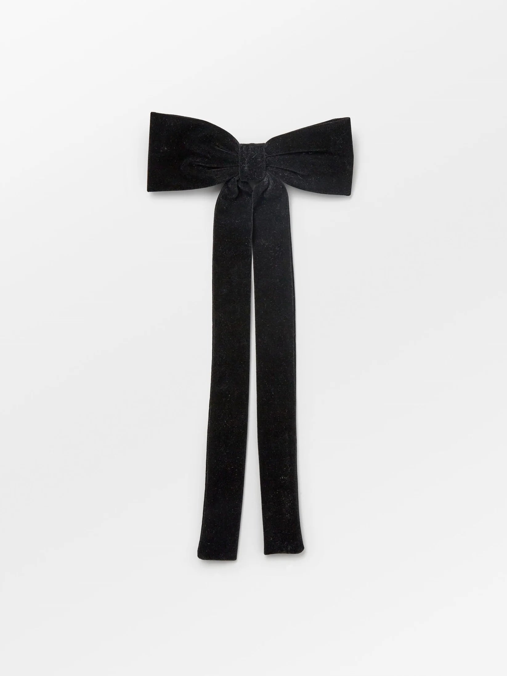 Beck Sondergaard black velvet bow hair clip shown on a white background