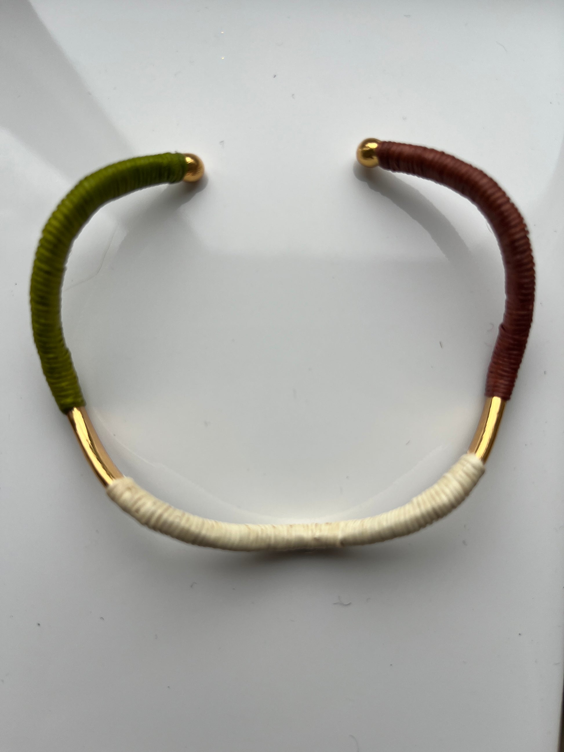 Ethically sourced bangle in cream, green and terracotta