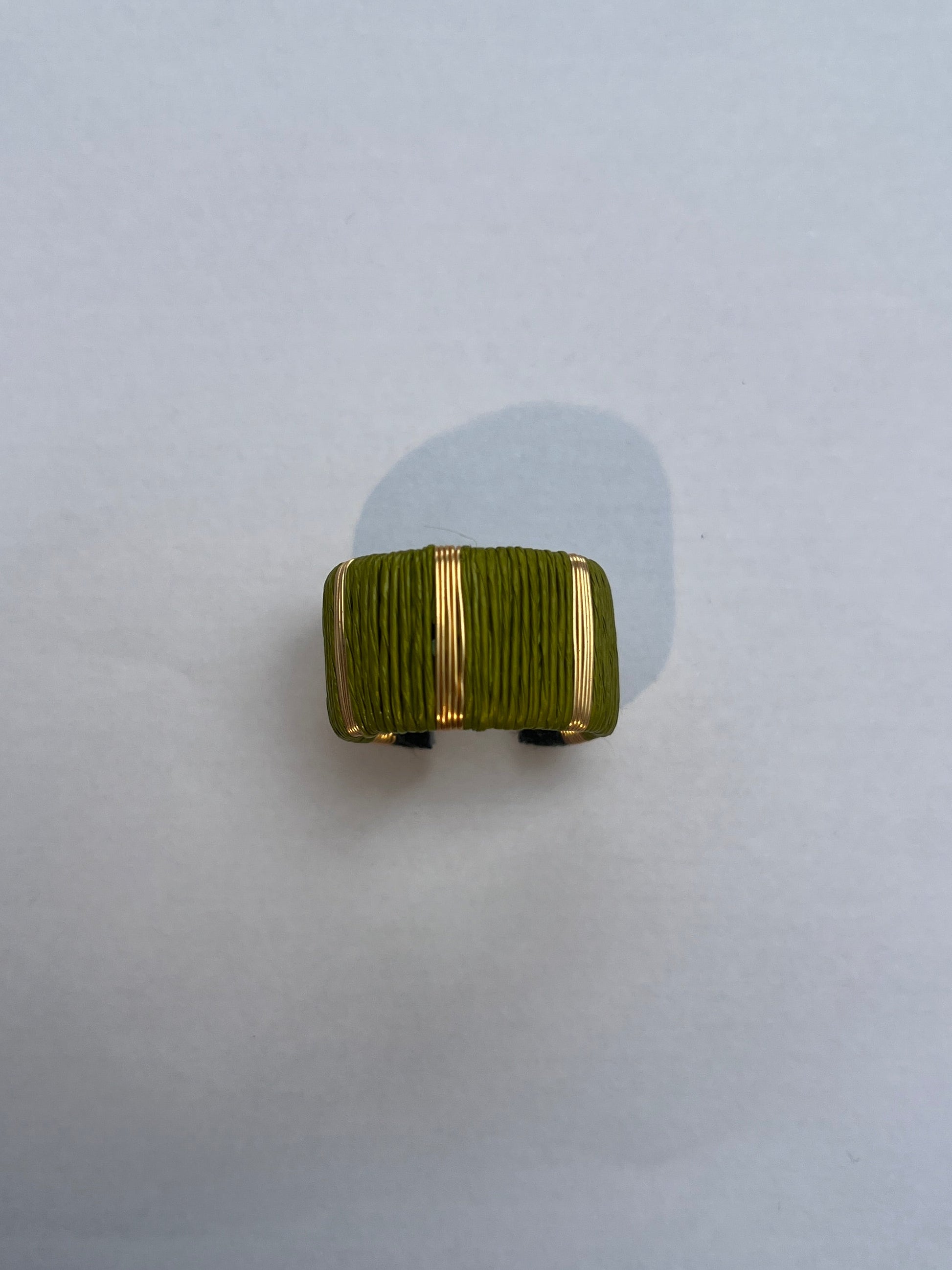 Green and gold stripe ring
