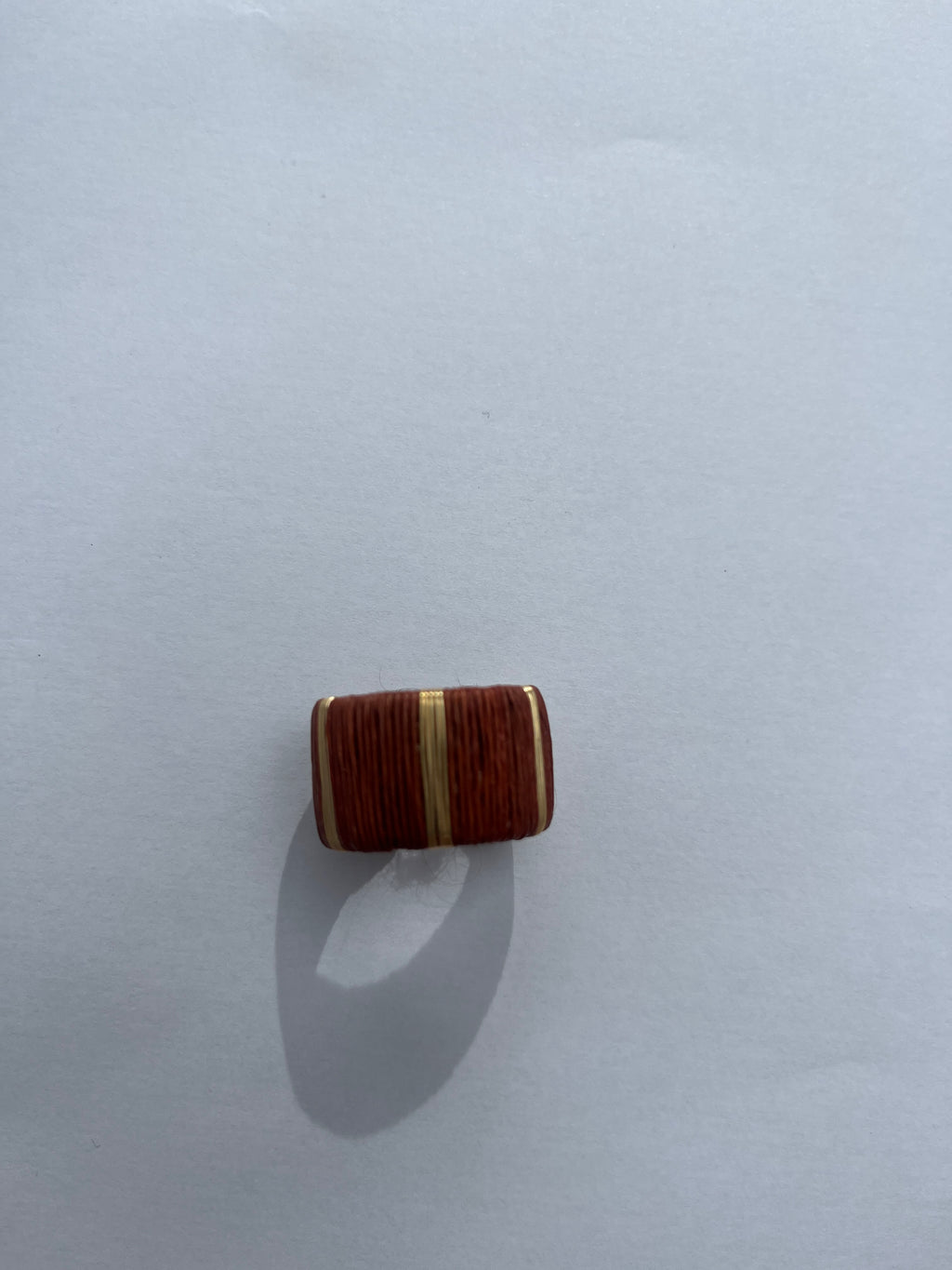 Tonina ring in terracotta and gold stripe