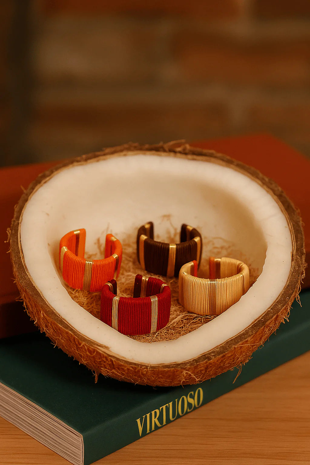 Colombian artisan rings in natural Werregue palm shown in a coconut