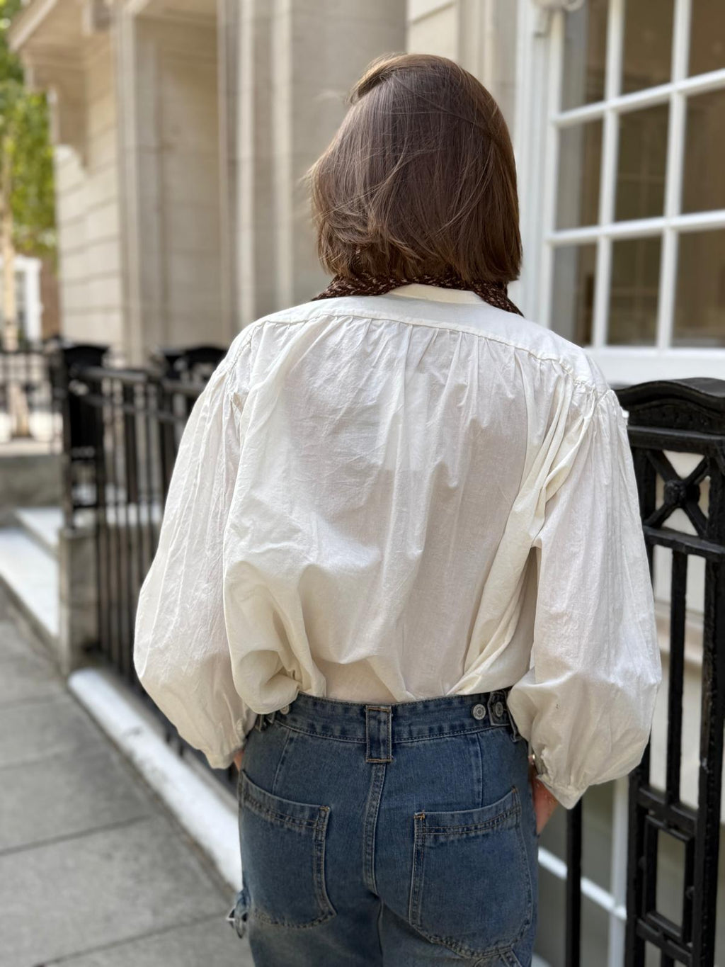 Timeless cream cotton frill blouse shown from back